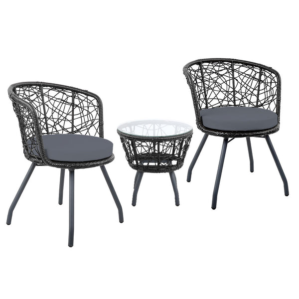 A three-piece outdoor bistro set comprising two high-backed chairs with black cushions and a round rattan table with a clear glass top on a black frame, set against a white background.