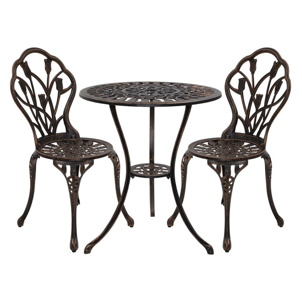 A bronze Gardeon 3-piece outdoor bistro set, including a round table and two chairs with a tulip floral pattern on the frame, made of cast aluminum, and set on a white background.