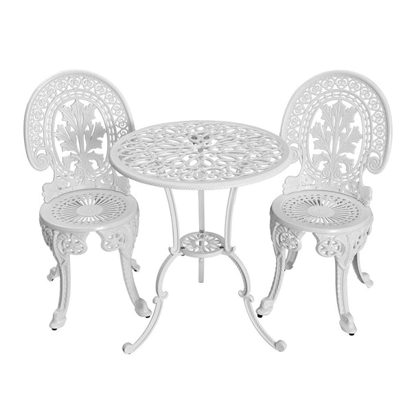 A white Gardeon 3-piece patio furniture set including a round table and two chairs with intricate cut-out patterns, designed for outdoor bistro use.