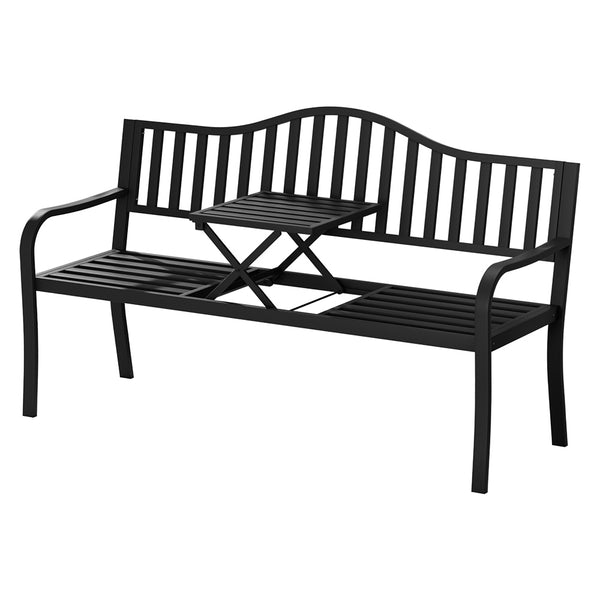 A black steel outdoor garden bench with a foldable table, featuring a slatted design for the seat and backrest, and a powder-coated finish and set on a white background.