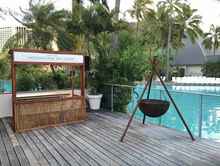 Load image into Gallery viewer, The Tripod Fire Pit on a deck at a pool side