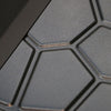 Close-up image of the metal on a metal fire pit.