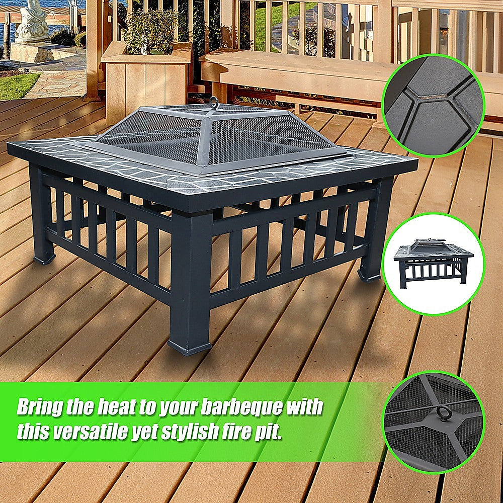 Square Metal Fire Pit Outdoor Heater set in a table with a mesh screen top with a faux-stone finish and set on a wood decking with matching wooden bench, planter and fencing, there's a house, garden, jetty and body of water in the backdrop. There are 3 inserted close-up images of parts of the firepit.