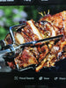 Close-up of roasted meat on a skewer with a blurred background