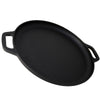 A pre-seasoned black cast iron pizza baking pan with handles.