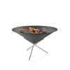 Modern fire pit with three logs on a white background