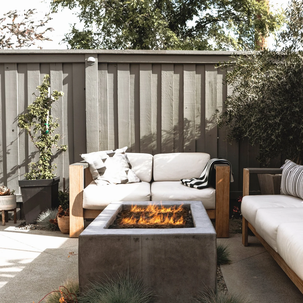 Galio Gas Fire Pit H Insert - 60cm Square set in a cement casing in a garden area - Hot Fire Pits Australia