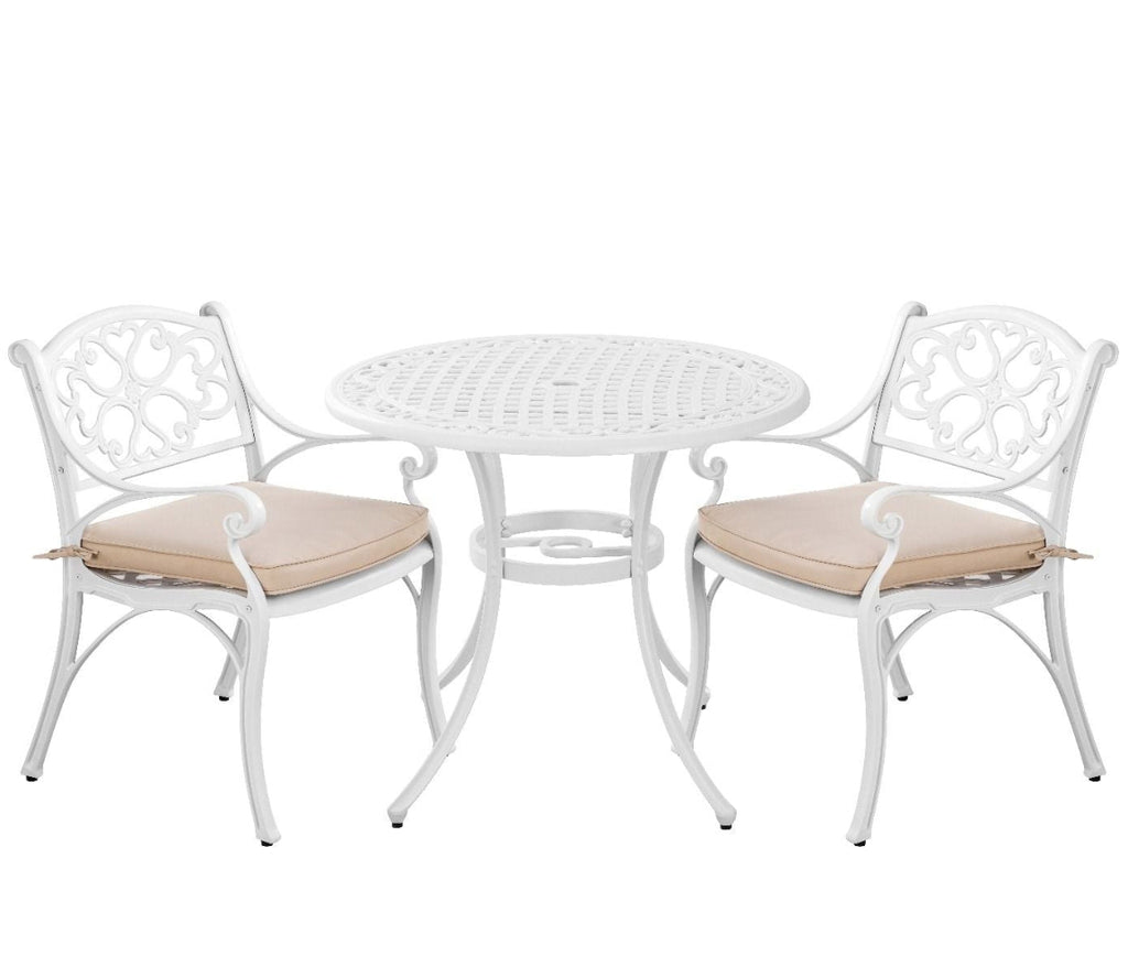 White outdoor table with two matching chairs on a white background