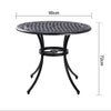 Round black metal table with dimensions on a white background
