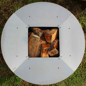 Wood stacked inside a square centred Ringgrill BBQ Grill