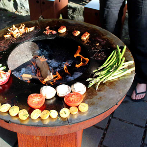 Cooking potatoes, asparagus, tomatoes, mushrooms and more on a Teppanyaki style Ringgrill BBQ Grill