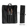 Black carrying case with grill tools and instructions on roll-up and ease of carrying.