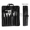 Set of BBQ tools in a black carrying case with a roll-up feature on a white background.