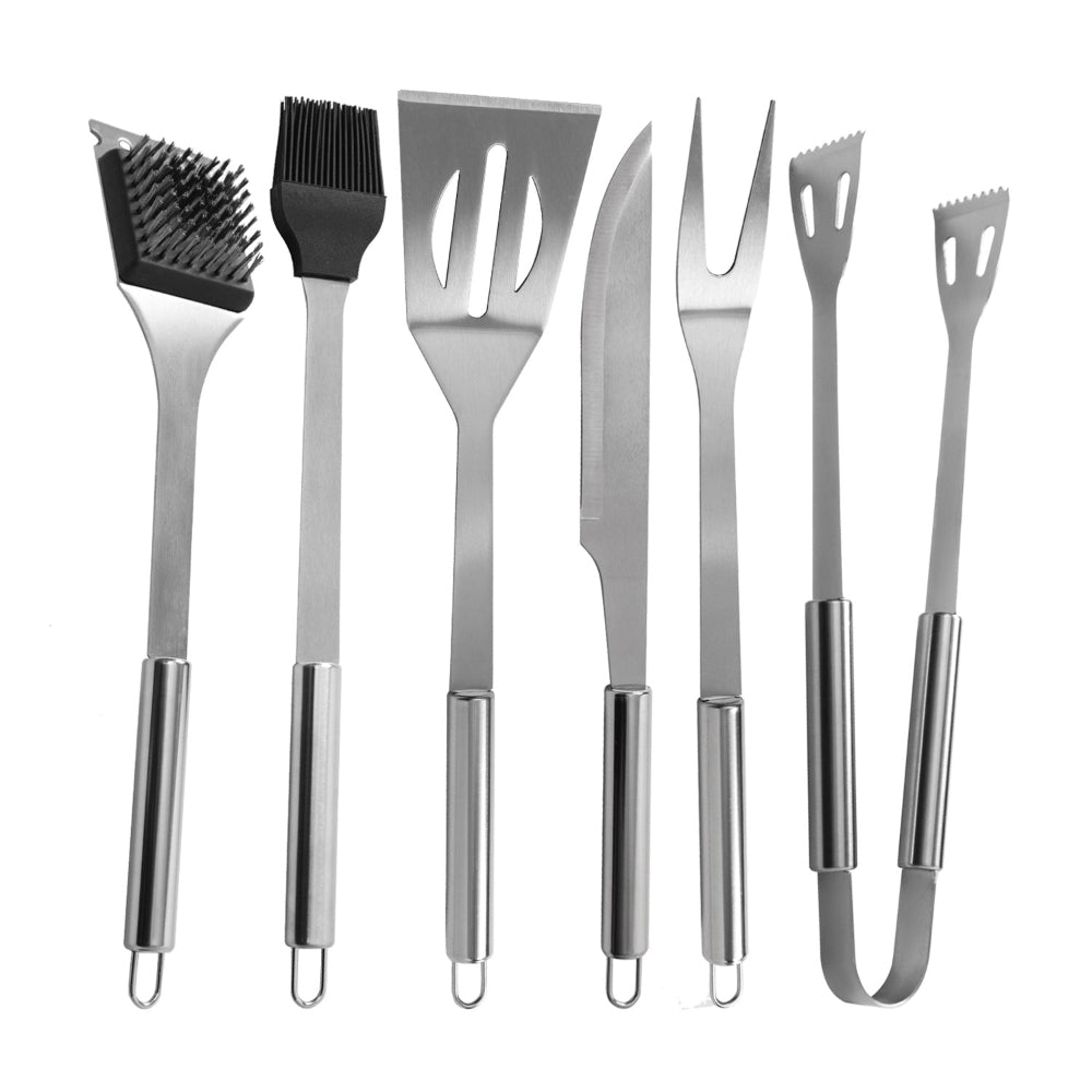 Set of stainless steel barbecue tools on a white background