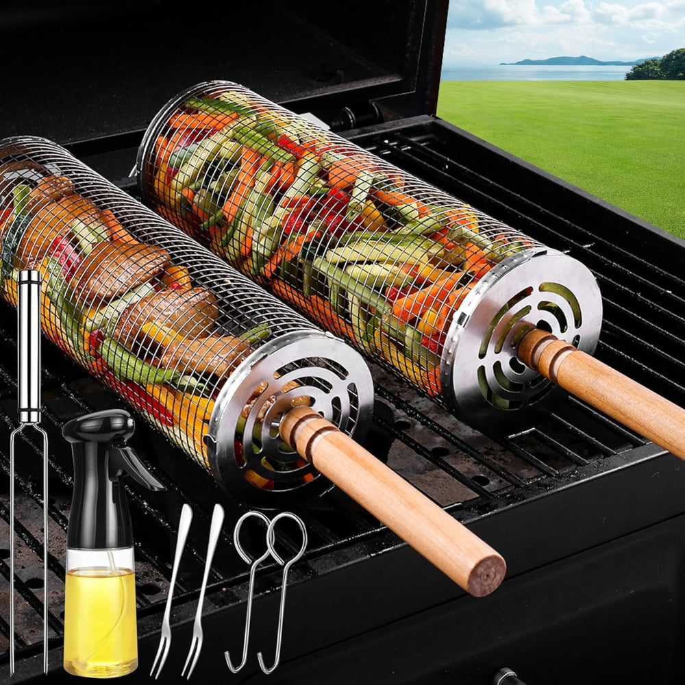 BBQ Grill baskets with vegetables on a grill, surrounded by cooking tools and oil bottle.