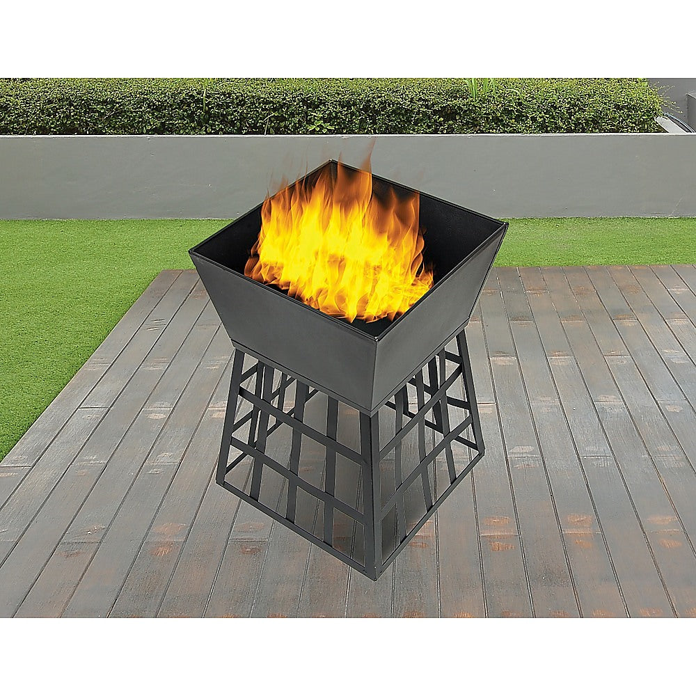 Black metal fire pit with flames on a wooden deck