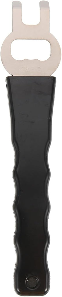 Black tool with a metallic handle on a black background