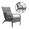 Gray wicker chair with cushions and a bonus cushion cover on a white background