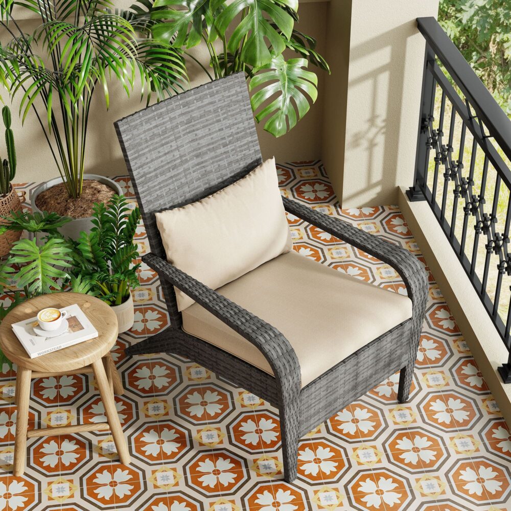 Chair with beige cushion on a balcony with plants and a small table.
