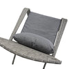 Gray wicker chair with a matching cushion on a white background