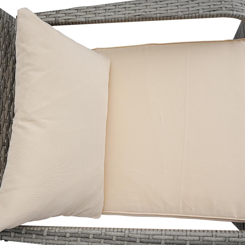 Beige outdoor cushions on a wicker chair