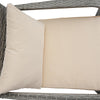 Beige outdoor cushions on a wicker chair