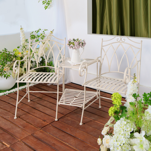 Companion 3 Piece Outdoor Setting in white colour in a patio setting with house wall and plants in the backdrop.