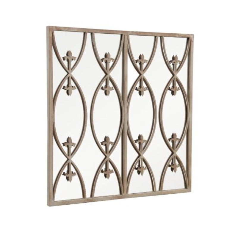 Decorative metal wall panelled mirror with intricate designs on a white background