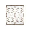 Decorative metal wall panel with intricate patterns on a white background