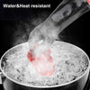 Cooking gloves lifting a piece of meat out of boiling water with text 'Water&Heat resistant'.
