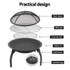 Image showing all the individual parts of a portable black fire pit, featuring a mesh dome lid, BBQ grill, charcoal rack, steel frame with safety rim and foldable legs, set on a white background.