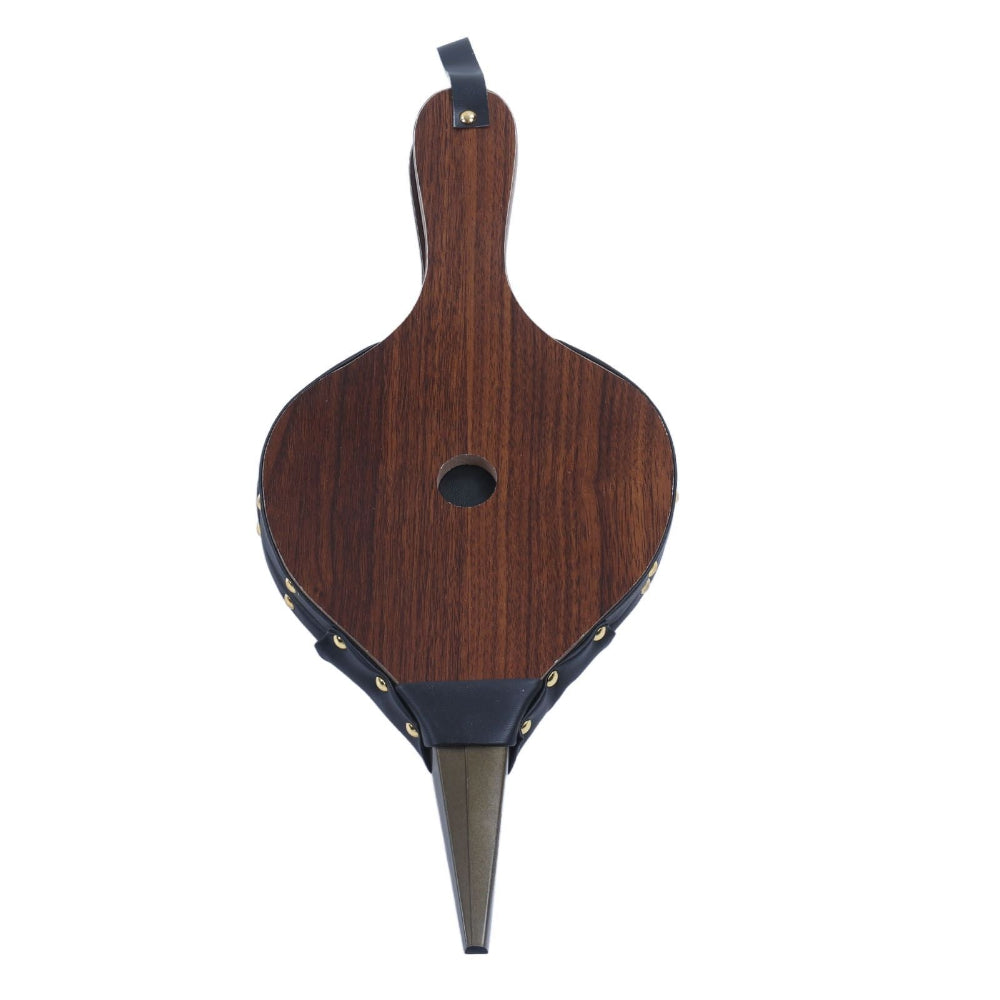A wooden fireplace bellow shown from the back, featuring a dark brown wood grain finish, black leather binding with brass studs, and a metal blowhole at the pointed bottom, isolated on a white background.