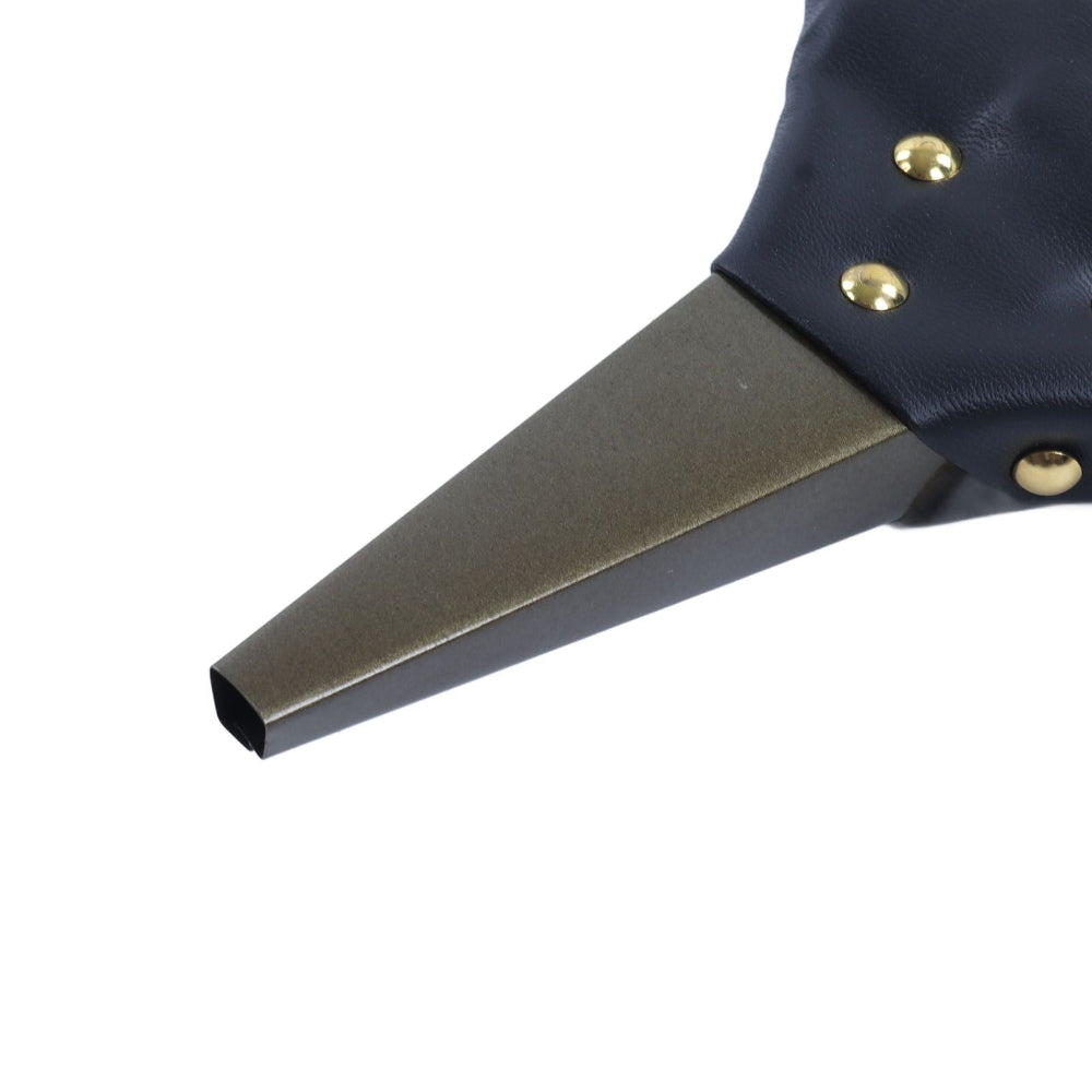 Close-up of a modern, angular tool with a matte dark gray metallic beak-like tip and a black textured handle secured by brass rivets, set against a solid white background.