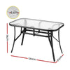 Glass dining table with black metal frame and dimensions indicated on a white background