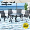 Outdoor furniture set with table and chairs on a patio with ocean view, featuring text about powder-coated steel frame and capacity.