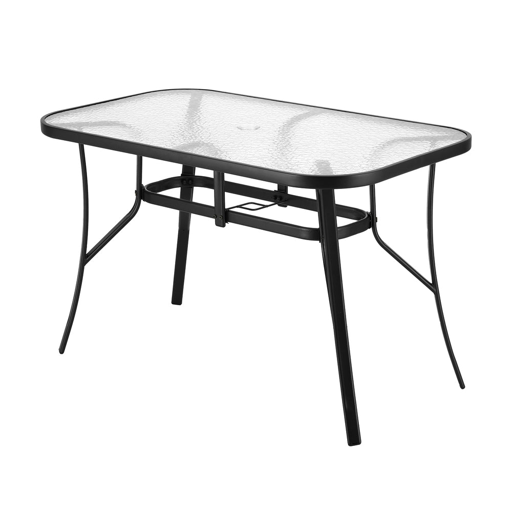 Glass dining table with black metal frame on a white background