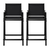 Two black bar stools on a white background