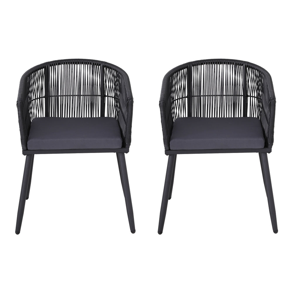 Two black chairs with woven backrests and cushions on a white background
