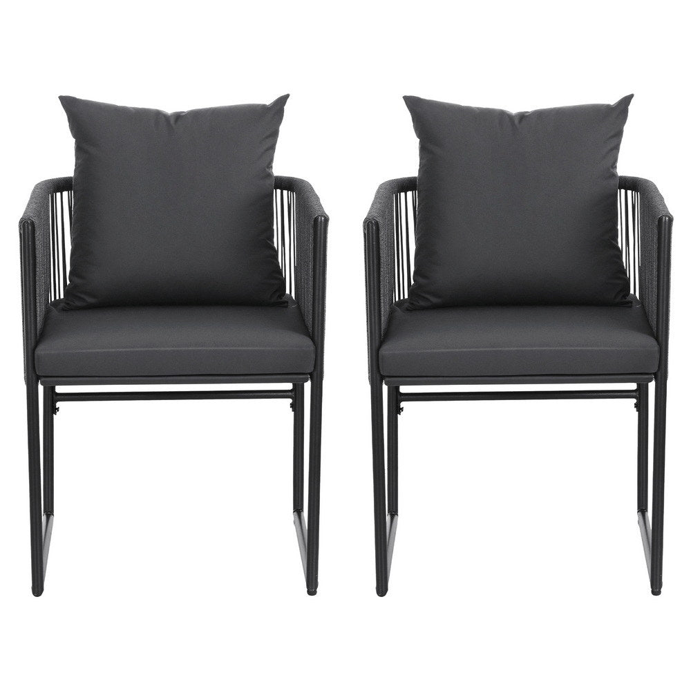 Two black chairs with gray cushions on a white background