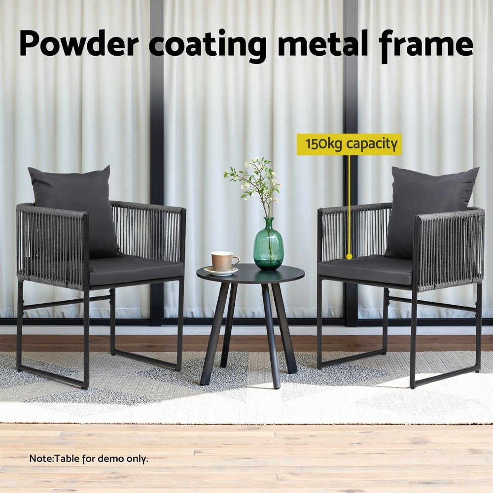 Two chairs with a small table in a room setting, featuring powder coating metal frame.