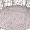 Close-up image of the seat part of a grey rattan chair showing its design and weaving and set against a white background.