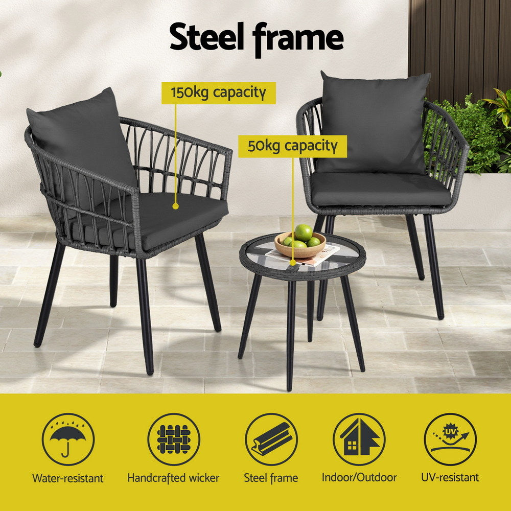 Outdoor furniture set with chairs and a table on a patio, featuring steel frame and wicker design.