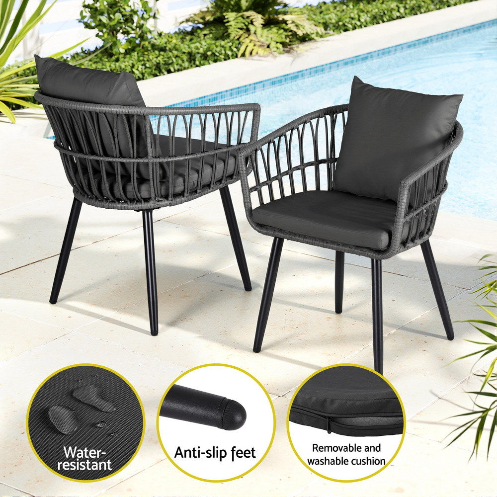 Two black outdoor chairs with cushions by a pool, featuring water-resistant, anti-slip feet, and removable washable cushion text.