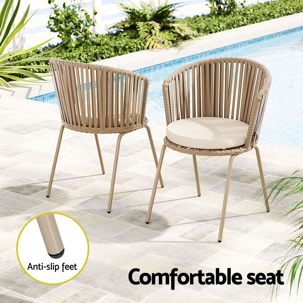 Two beige chairs with rope weaving and cream cushions, on a tiled surface at a poolside, one chair facing forwards and one backwards, inset showing close-up image of an anti-slip foot.
