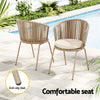 Two beige chairs with rope weaving and cream cushions, on a tiled surface at a poolside, one chair facing forwards and one backwards, inset showing close-up image of an anti-slip foot.