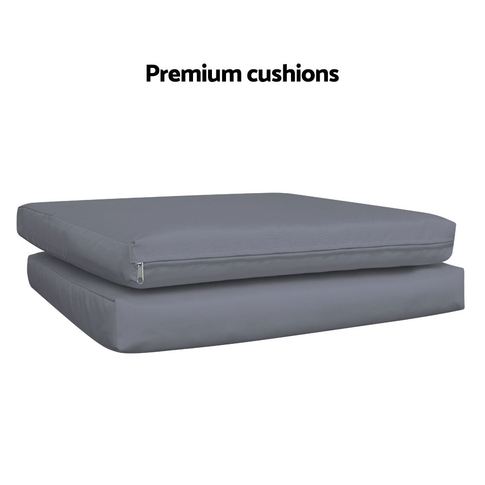 Two black chair cushions on top of each other with a white background and the word 'premium cushions' above them.
