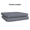 Two black chair cushions on top of each other with a white background and the word 'premium cushions' above them.