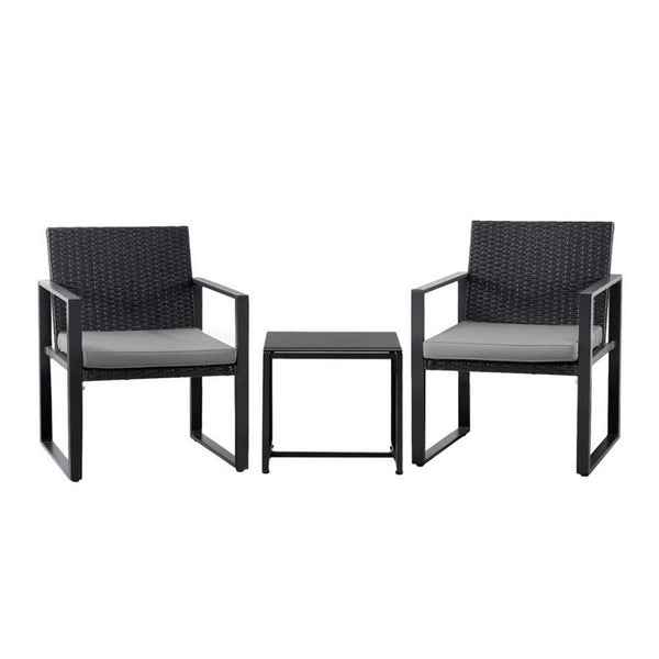 Two black chairs with gray cushions and a matching table on a white background