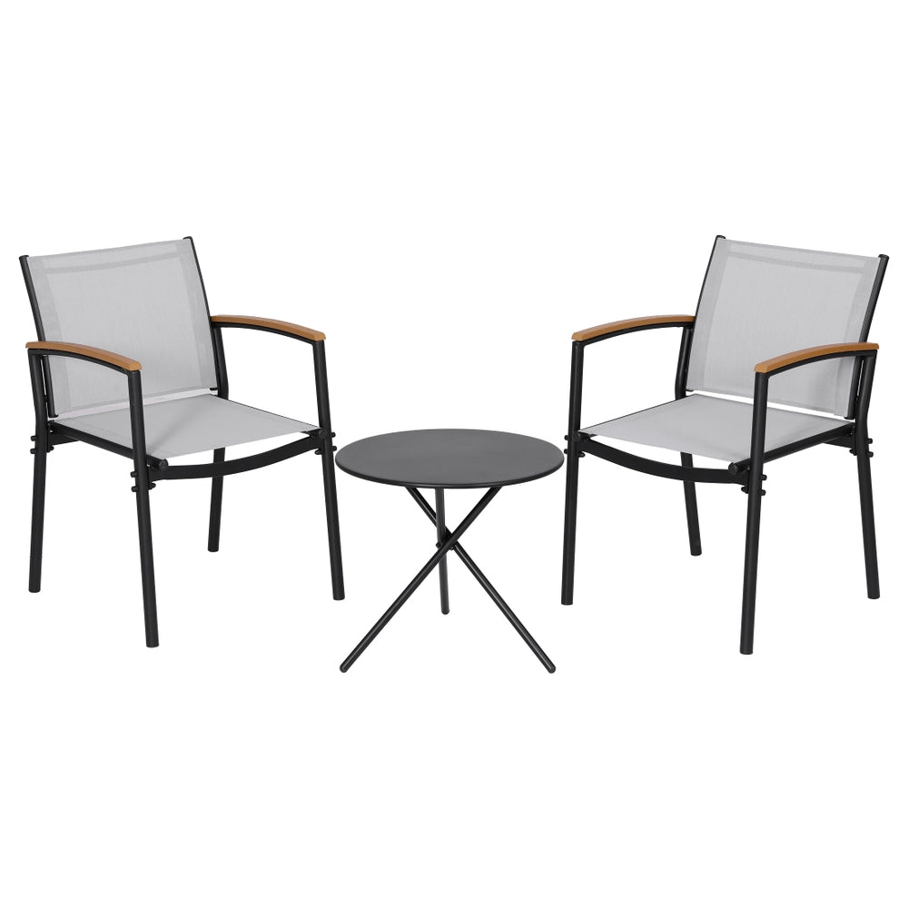 Two chairs with a small round table on a white background