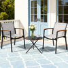 Outdoor patio set with two chairs and a small table on a patterned patio floor.